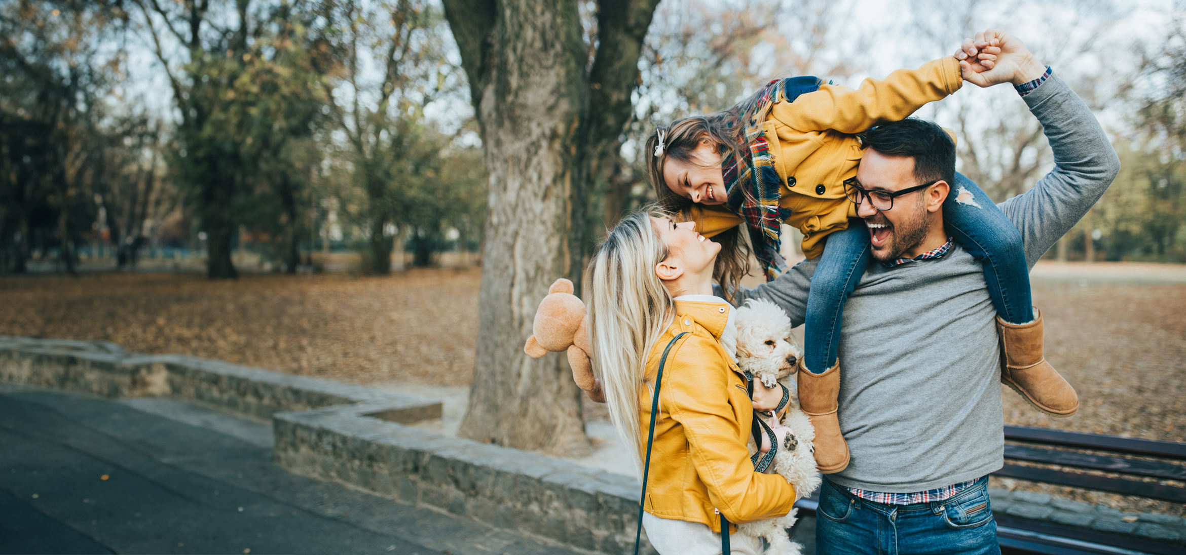 Family and dog being silly outside