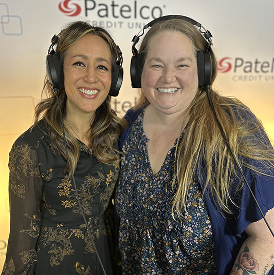 Patelco Employees Michele Enriquez and Melissa Steed at the podcast desk.